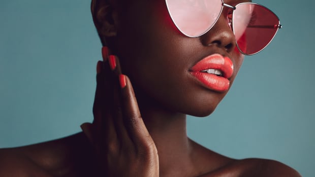 dark-skinned Black women with red "added"