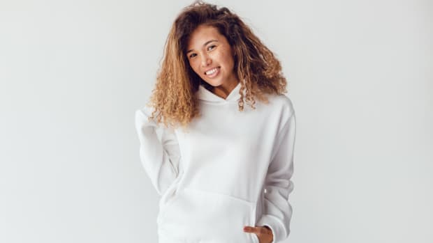 woman in a white jogging suit