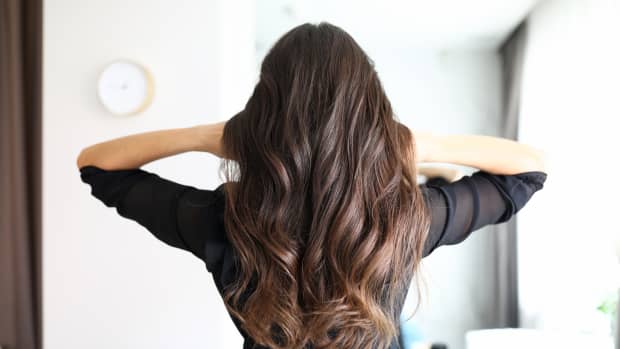 the back of a woman with long hair