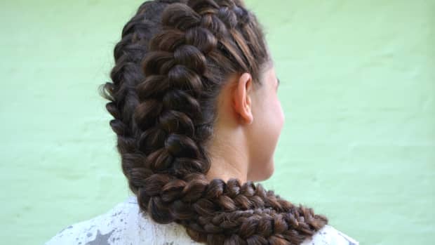 woman with a brown fishtail braid