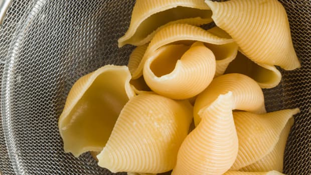 large shell noodles in a strainer