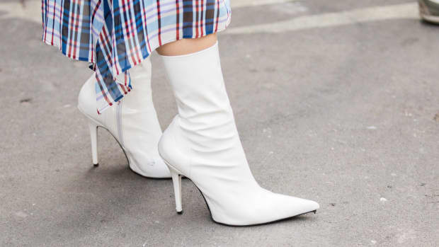 woman with white ankle boots