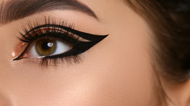 a woman with eyeliner on