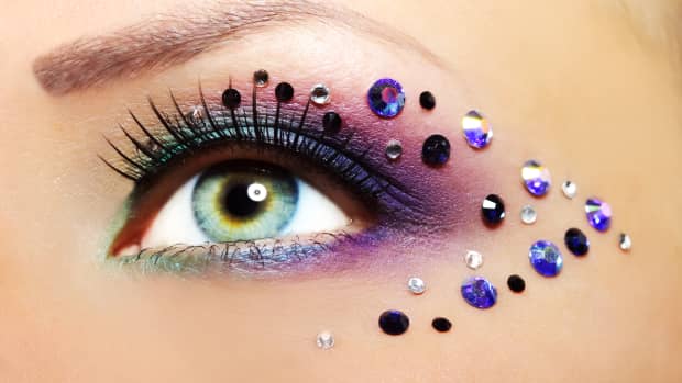 close up of eye with gemstones