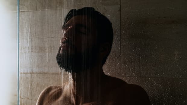 man enjoys a shower.
