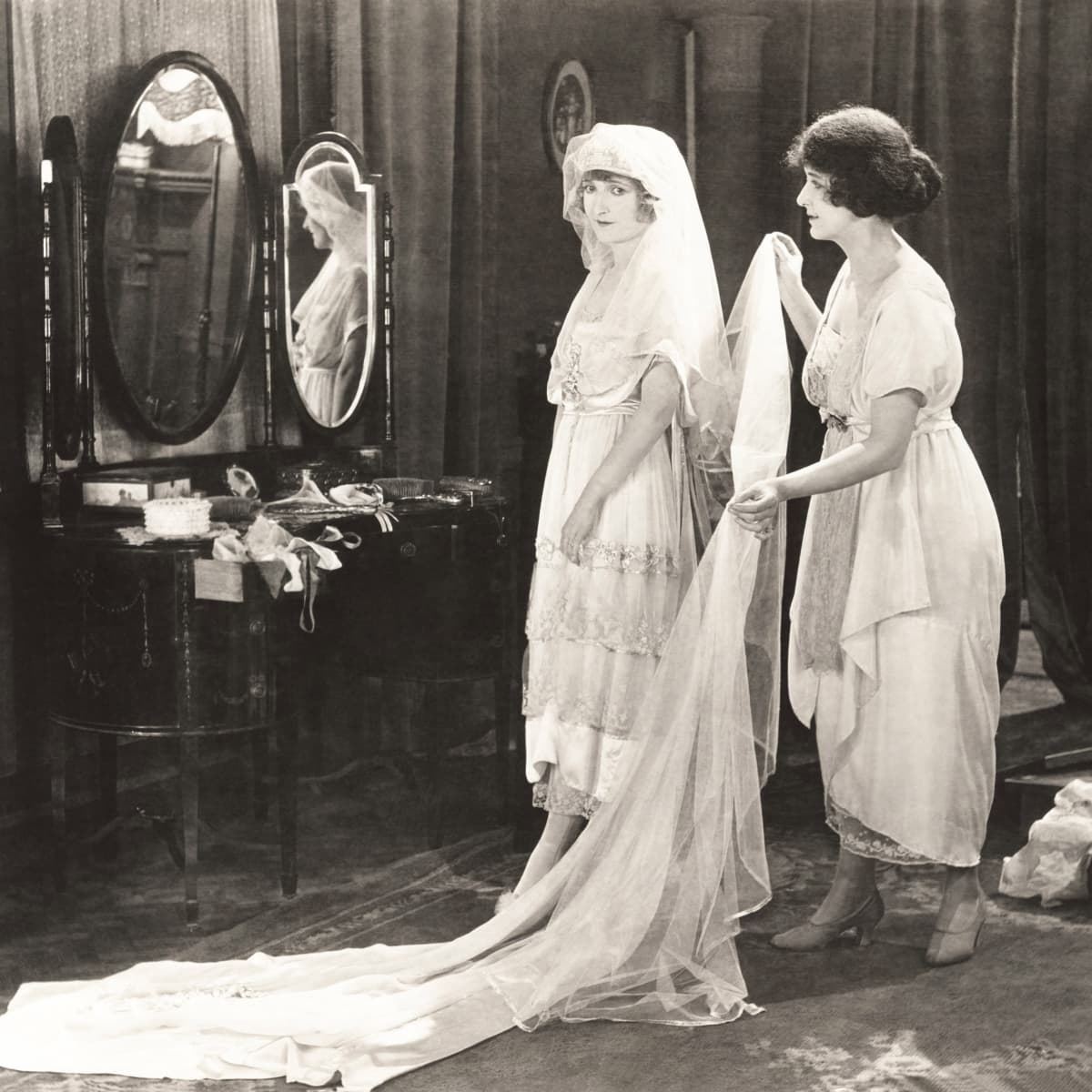 Woman Shows Off Vintage Bridal Collection With Wedding Dresses